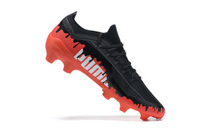 Botas de fútbol para césped Ultra FG en color negro, amarillo y naranja